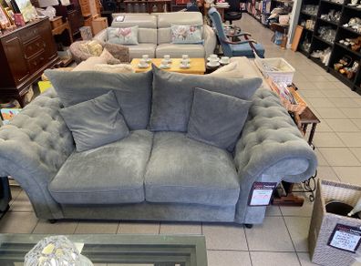 Grey two seater sofa