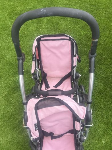 pink twin pram for dolls