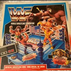 WWF Hasbro ring, 1 boxed used and 1 loose used + figures