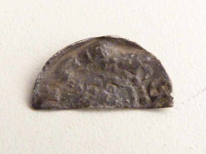 Cut long cross silver penny