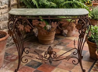 This old console table is handmade wrought iron