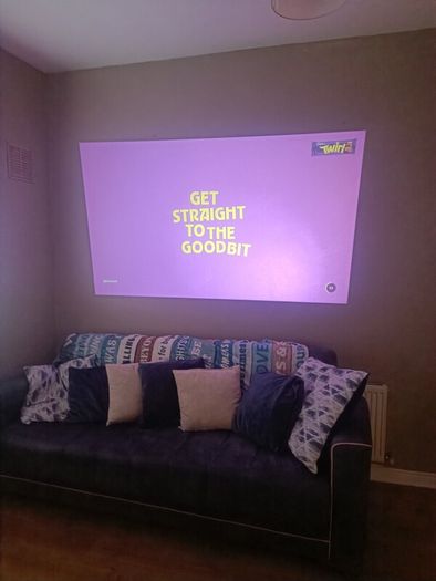philips neopix ultra 2tv+ home projector and height adjustable stand, built in speakers and android TV with play store stand comes with power point bracket on it as seen in pictures also remote and phone holder