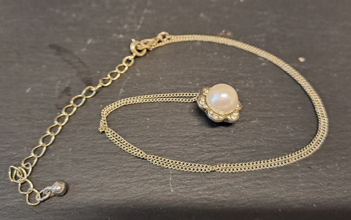 Pearl, diamond pendant and silver necklace