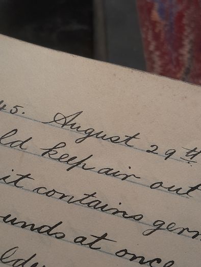 two hand written books