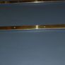 Chest drawers with brass strip suitcase set down Image 6