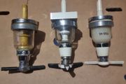 Three vintage optics.