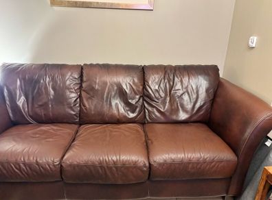 Brown 3 Seater leather couch