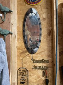 Vintage oval wall mirror sconce