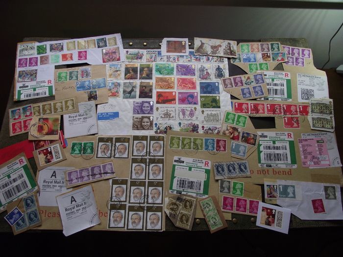 A box with collection of stamps from Great Britain