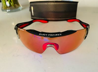 rudy project glasses iridium red (ekoi, Oakley, rudy, 100%)