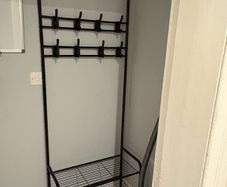 Coat rack with shoe storage