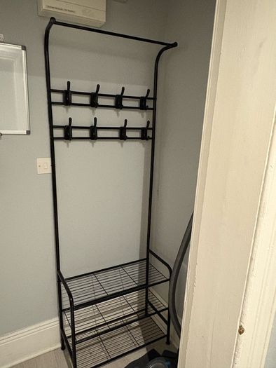 Coat rack with shoe storage