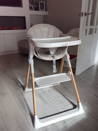 Mash high chair with changeable baby seat.