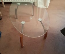 Glass coffee table with wood and steel legs