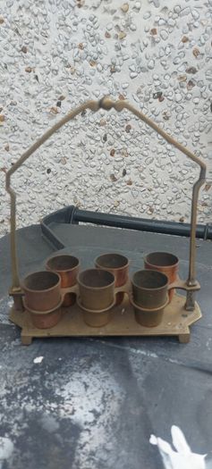 vintage copper ,brass shot rack ,,unusual,,see pictures for condition, used condition, needs a clean ,sold as seen buyer collects or pays postage thank you