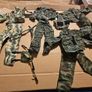 3 Power Team Action Figures plus 2 similar figures plus loads of clothes and accessories mixed lot Image 4