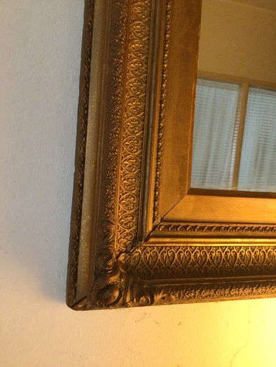 Big very old rectangular gilt framed mirror