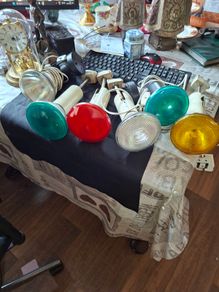 Large Theatrical or Display Lighting, including reflector lamps and colored PAR-style bulbs, with various lamp holders, plugs, and coiled electrical leads all working