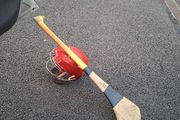 hurling helmet and hurl