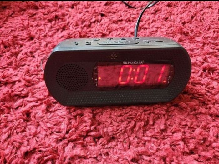 Radio clock alarm