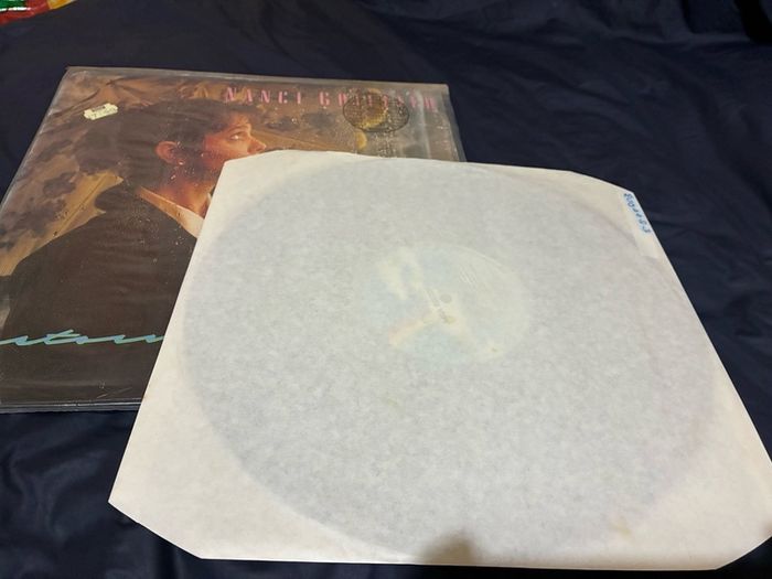A Nanci Griffith record collection.