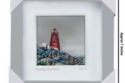 Poolbeg Lighthouse from the rocks, framed print by Helen Mathews