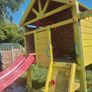 Playhouse with swings, slide, look out tower, picnic table and basketball hoop Image 2