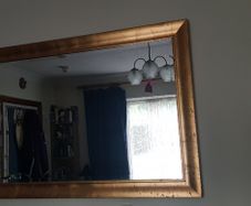 Large gold framed mirror