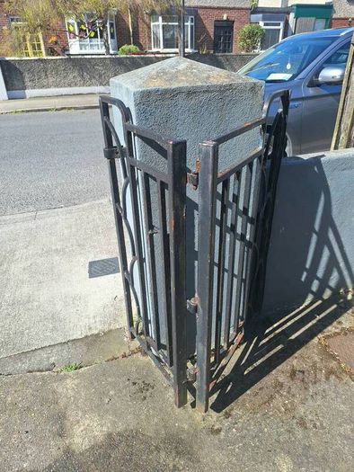 Black wrought iron mdtal double garden gates