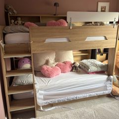Kids bunk bed with shelving