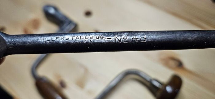 Brace and expanding bit