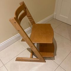 Child's height adjustable wooden chair