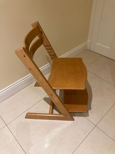 Child's height adjustable wooden chair
