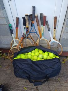 300 Tennis balls and rakects