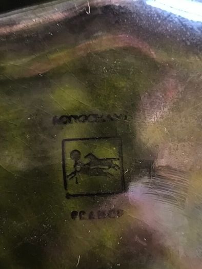vintage Moet & Chandon shield-shaped ceramic advertising piece.