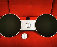 Bang & Olufsen BeoSound 8 premium Speaker System with Original Remote and Bluetooth adapter.