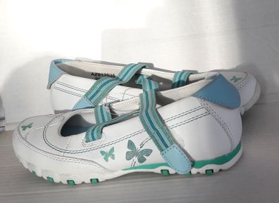 New white shoes with butterfly design
