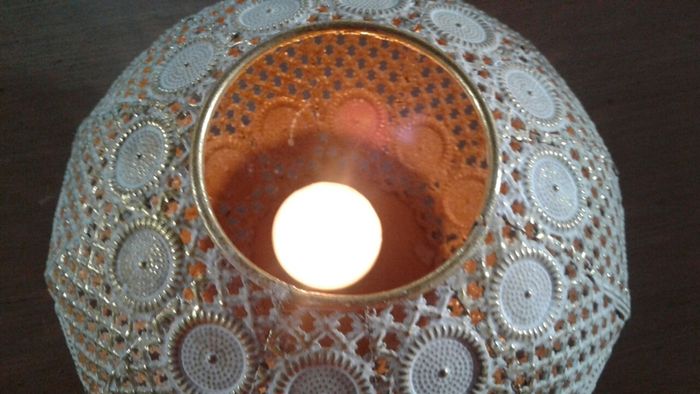 Decorative metal candle holder