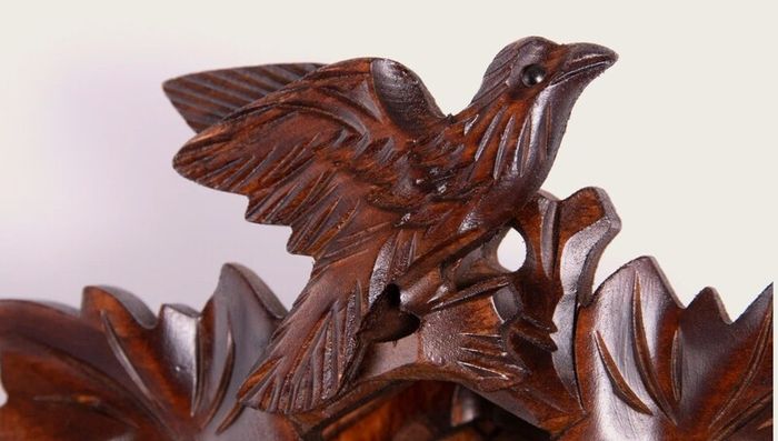 Traditional Carved Cuckoo Clock with Music  Quartz Movement, 12 Melodies & Light Sensor