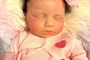doll.         Full bodied silicone baby doll