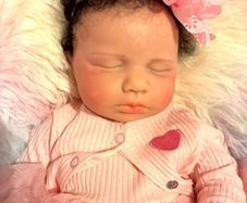 doll.         Full bodied silicone baby doll