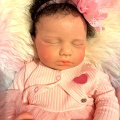 doll.         Full bodied silicone baby doll