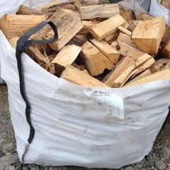 Ton bags of dry hard wood.