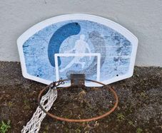 Wall mounted basketball hoop