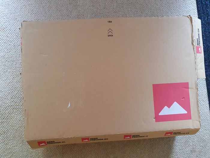 Large flat cardboard box for under bed storage