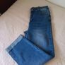 Mid-wash Distressed Jeans with Cuffed Hem. Image 7