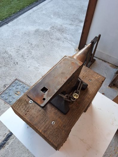 anvil on timber stand
