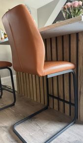 2 Tan High Stools