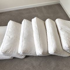 6 Duck feather pillows 10 euros each or all 6 for 50