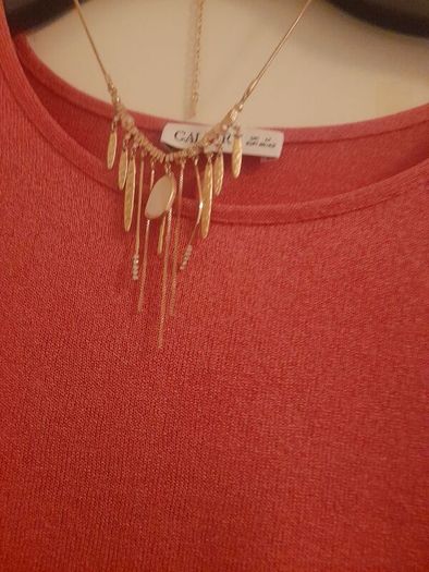 ladies deep pink top with added rose gold neck piece